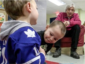 Roch Carrier read The Hockey Sweater to kids at the N.D.G. YMCA library in Montreal, on Tuesday, December 16, 2014 organized by the Fraser-Hickson Institute.