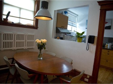 Another view of the dining room with the kitchen in the background.