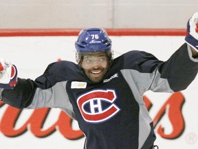 Canadiens defenceman P.K. Subban celebrates after scoring a goal during practice at the team's training facility in Brossard on Dec. 19, 2014.