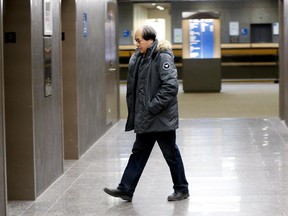 MONTREAL, QUE.: DECEMBER 22, 2014-- Diran Lin, the father of Jun Lin, leaves the Montreal Courthouse in Montreal on Monday December 22, 2014. Lin left the courthouse after day 7 of the deliberation of the jury in the Luka Rocco Magnotta trial.  (Allen McInnis / MONTREAL GAZETTE)