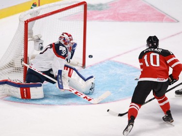 MONTREAL, QUE.: DECEMBER 26, 2014 -- Anthony Duclair of Team Canada scores on Denis Godla of Team Slovakia in the first period of a preliminary round hockey game at the IIHF World Junior Championship at the Bell Centre in Montreal, on Friday, December 26, 2014. (John Kenney / MONTREAL GAZETTE)