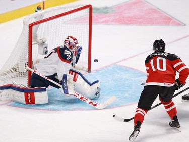 Canada's Anthony Duclair scores on Slovakia's Denis Godla during the first period of a preliminary round hockey game at the IIHF World Junior Championship at the Bell Centre on Friday, Dec. 26.