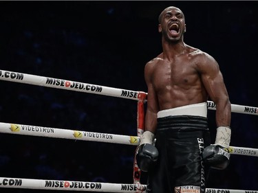 Schiller Hyppolite of Montreal reacts after beating Norbert Nemesapati of Hungary for their light heavyweight boxing match at the Bell Centre in Montreal on Saturday, December 6, 2014.