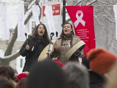 Singers perform during during an École Polytechnique  massacre commemoration event at Place du Decembre 6 - 1989 in Montreal, Saturday December 6, 2014.  It was part of a day of commemorations to mark the 25th anniversary of the murder of 14 women at the school, by Marc Lépine.