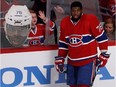 A young fan tries to get the attention of the Canadiens' P.K. Subban before a playoff game against the Boston Bruins at the Bell Centre on May 27, 2014.