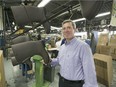 Genfoot CEO Richard Cook with his company's products at its eco-friendly facility in Saint-Laurent, QC, on Friday, November 14 2014.