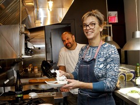 Anabela Goncalves, with her husband, Jose Ignacio Rodriguez, in their Bistro Piquillo: Entertaining Portuguese-style is casual and "in the moment," she says.