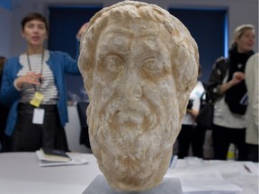 A portrait of Homer during an unboxing at the Pointe-à-Callière Museum in Montreal on November 26, 2014. The piece is part of a major exhibition showcasing Greece's history.