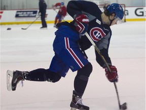 Canadiens defenceman Nathan Beaulieu takes a slapshot during practice at the Bell Sports Complex in Brossard on Nov. 7, 2014.