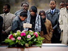 Family members attend the funeral of Maria Altagracia Dorval at the Mount Pleasant Cemetery in Laval  Saturday, October 30, 2010. Altagracia-Dorval had called police about a threat from her ex-husband and was killed by him before police responded. (Peter McCabe / MONTREAL GAZETTE )