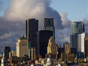 The Montreal city skyline seen from the Jacques-Cartier bridge in Montreal on Sunday, September 23, 2012.