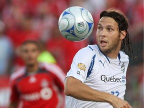 The Impact's Adam Braz gets a close look at the ball while playing against Toronto FC during the Nutrilite Canadian Championship on July 22, 2008 in Toronto.