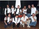 The Nomads chapter in happier times. - A group photo taken while they celebrated the August 5, 2000 wedding of Hells Angel René Charlébois, just months before Operation Springtime 2001 was carried out. From left to right top: Michel Rose (sentenced to 22 years), Donald (Pup) Stockford (sentenced to 20 years), Gilles (Trooper) Mathieu (sentenced to 20 years), Richard (Dick) Mayrand (sentenced to 22 years), Denis Houle (sentenced to 20 years), David (Wolf) Carroll (yet to be arrested in Operation Springtime 2001). From left to right bottom: Walter (Nurget) Stadnick (sentenced to 20 years), René Charlébois (sentenced to 20 years), Normand Robitaille (sentenced to 21 years), Maurice (Mom) Boucher (sentenced to life in prison for ordering the deaths of two prison guards). 
