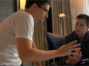 NSA whistleblower Edward Snowden (left) and journalist Glenn Greenwald in a scene from Laura Poitras's documentary Citizenfour.