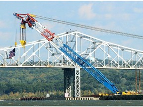 Look kind of familiar? In fact, the photo show's New York's Tappan Zee Bridge over the Hudson River. Like Montreal's Champlain span, it is soon to be replaced, a project that will be almost entirely funded by tolls.