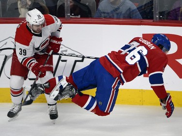 Montreal Canadiens defenceman P.K. Subban (76) is upended by Carolina Hurricanes right wing Patrick Dwyer (39) during second period National Hockey League action Tuesday, December 16, 2014 in Montreal.