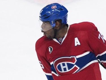 Montreal Canadiens' P.K. Subban celebrates after teammate Jiri Sekac scored against the Los Angeles Kings during first period NHL hockey action in Montreal, Friday, December 12, 2014.