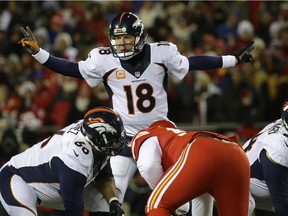 Denver Broncos quarterback Peyton Manning calls a play during NFL game against the Chiefs in Kansas City on Nov. 30, 2014.