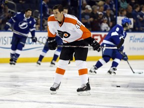 Vincent Lecavalier warms up before his first game back against the Lightning at the Tampa Bay Times Forum on Nov. 27, 2013.