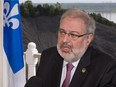 Quebec Natural Resources Minister Pierre Arcand speaks at a news conference on petroleum and gas exploration Friday, May 30, 2014 in Quebec City.