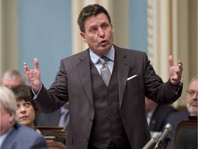 Quebec Municipal Affairs Minister Pierre Moreau speaks during question period Wednesday, November 12, 2014 at the legislature in Quebec City.