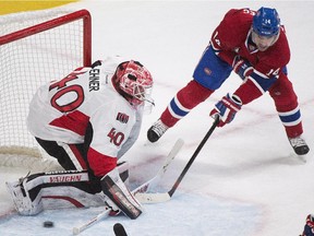 Montreal Canadiens' Tomas Plekanec scores against Ottawa Senators goaltender Robin Lehner during third period NHL hockey action in Montreal, Saturday, December 20, 2014.