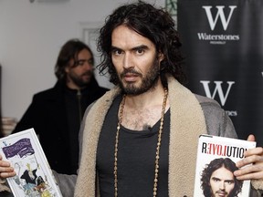 Russell Brand's chest hair on display.