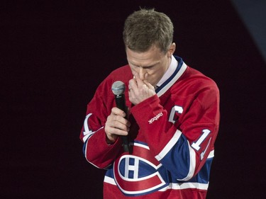 Former Montreal Canadiens captain Saku Koivu pauses during his speech during a ceremony honouring his career Thursday, December 18, 2014 in Montreal.