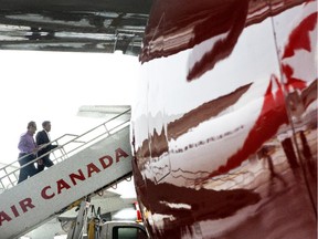 Air Canada launched its low-cost "leisure carrier" Air Canada Rouge Monday and reports that all of its scheduled flights from Montreal and Toronto left on time and were 95-per-cent filled to destinations including Venice, Athens and Jamaica.

(Guests climb aboard a plane in an Air Canada hanger at Toronto's Pearson Airport on Tuesday June 25, 2013, as the airline launches it's new "leisure carrier" Air Canada Rouge.