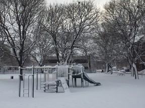 Snow covers a park off St-Jacques St. in St-Henri.
