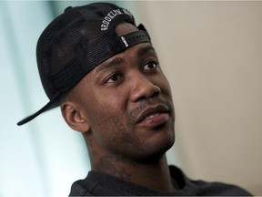 U.S. basketball player Stephon Marbury speaks during an interview in the lobby of his apartment building in Beijing on Nov. 18, 2014.