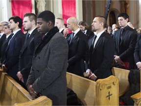 Current Canadiens players, including P.K. Subban, attend funeral for former Canadiens captain Jean Béliveau at Mary, Queen of the World Cathedral in Montreal on Dec.10, 2014.