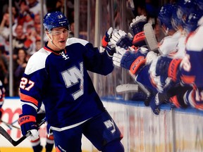 Anders Lee of the New York Islanders celebrates after a goal against the Tampa Bay Lightning at the Nassau Veterans Memorial Coliseum on Dec. 20, 2014.
