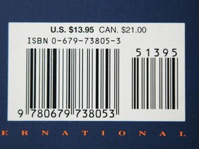 Montreal Gazette file photo: Canadian and U.S. prices appear on a book in this file photo from 2007.