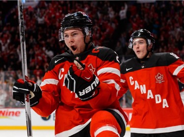 Curtis Lazar #26 of Team Canada celebrates his goal in a preliminary round game during the 2015 IIHF World Junior Hockey Championships against Team USA at the Bell Centre on December 31, 2014 in Montreal.
