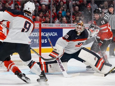 Thatcher Demko #30 of Team United States stretches out the pad to make a save during the 2015 IIHF World Junior Hockey Championship game at the Bell Centre on December 31, 2014 in Montreal, Quebec, Canada.