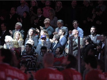 Family members of the late Montreal Canadiens player Jean Béliveau during a ceremony prior to the NHL game between the Montreal Canadiens and the Vancouver Canucks at the Bell Centre on December 9, 2014 in Montreal.