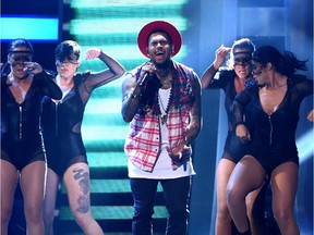 Recording artist Chris Brown performs onstage during the 15th Annual Latin GRAMMY Awards at the MGM Grand Garden Arena on Nov. 20, 2014 in Las Vegas, Nevada.