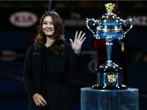 Li Na of China poses with the Daphne Akhurst Memorial Cup as she officially opens the Australian Open at Melbourne Park on Jan. 19, 2015.