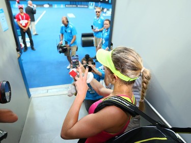 Eugenie Bouchard of Canada takes a selfie after winning her second round match against Kiki Bertens of the Netherlands during day three of the 2015 Australian Open at Melbourne Park on January 21, 2015 in Melbourne, Australia.