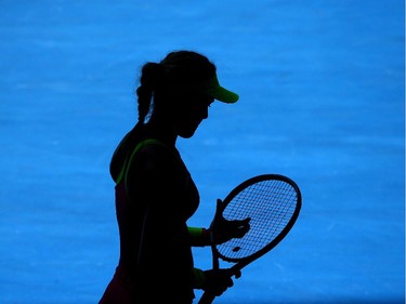 Eugenie Bouchard of Canada looks on in her third round match against Caroline Garcia of France during day five of the 2015 Australian Open at Melbourne Park on January 23, 2015 in Melbourne, Australia.