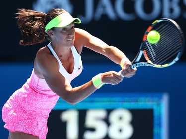 Caroline Garcia of France plays a backhand in her third round match against Eugenie Bouchard of Canada during day five of the 2015 Australian Open at Melbourne Park on January 23, 2015 in Melbourne, Australia.