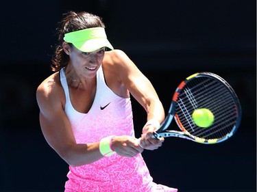Caroline Garcia of France plays a backhand in her third round match against Eugenie Bouchard of Canada during day five of the 2015 Australian Open at Melbourne Park on January 23, 2015 in Melbourne, Australia.