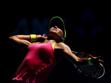Eugenie Bouchard of Canada serves in her third round match against Caroline Garcia of France during day five of the 2015 Australian Open at Melbourne Park on January 23, 2015 in Melbourne, Australia.
