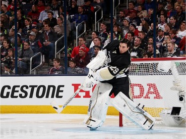 Marc Andre-Fleury of the Pittsburgh Penguins and Team Foligno tends goal during the Gatorade NHL Skills Challenge Relay event of the 2015 Honda NHL All-Star Skills Competition at Nationwide Arena on January 24, 2015, in Columbus, Ohio.