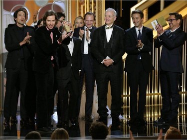 In this image released by NBC, filmmaker Wes Anderson, second left, accepts the award for best motion picture comedy or musical for "The Grand Budapest Hotel", at the 72nd Annual Golden Globe Awards on Sunday, Jan. 11, 2015, at the Beverly Hilton Hotel in Beverly Hills, Calif.