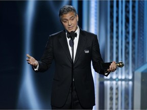 In this handout photo provided by NBCUniversal,  George Clooney, Winner of the Cecile B. Demille Award,  speaks onstage during the 72nd Annual Golden Globe Awards at The Beverly Hilton Hotel on January 11, 2015 in Beverly Hills, California.