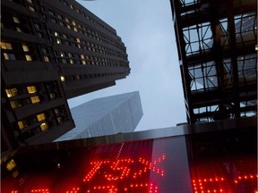 A TSX tote board is pictured in Toronto, on Dec. 31, 2012.