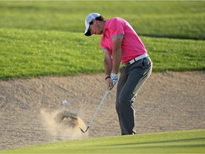 Rory McIlroy hits bunker shot during pro-am for the Abu Dhabi HSBC Golf Championship at Abu Dhabi Golf Club on Jan. 14, 2015 in Abu Dhabi, United Arab Emirates.