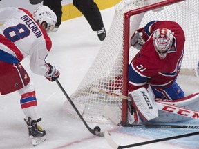 The Washington Capitals' Alex Ovechkin moves in to score against Canadiens goaltender Carey Price during game at the Bell Centre on Jan. 25, 2014.